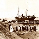 Kantara. Km. 45. Camel ferry and ships in transit.