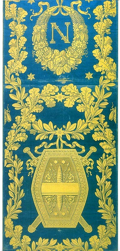 Blue damask with a yellow border and a shield motif decoration