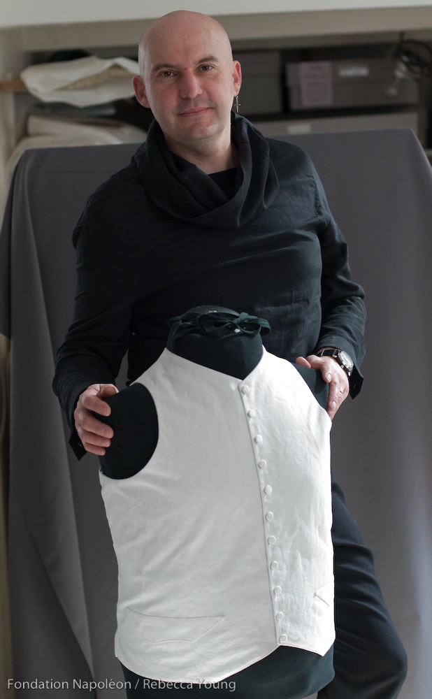 Costume designer Gaëtan Leudière with his copy of Napoleon's waistcoat © Fondation Napoléon / Rebecca Young